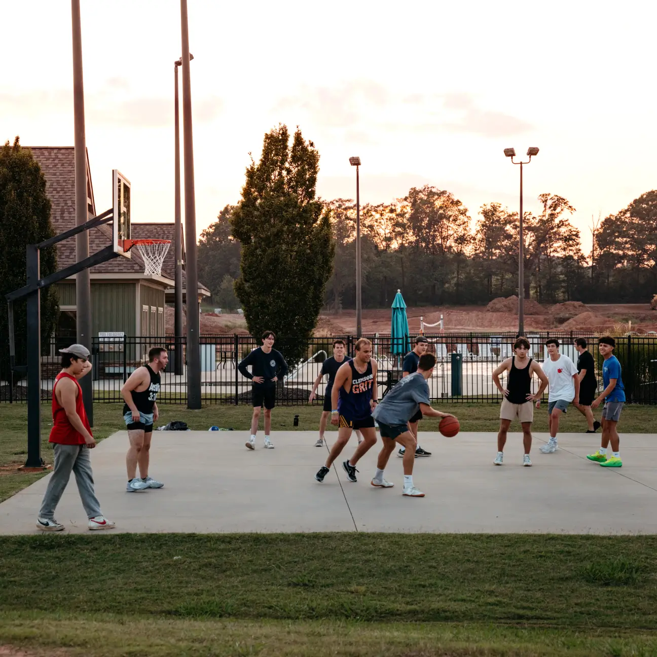 young men playing basketball